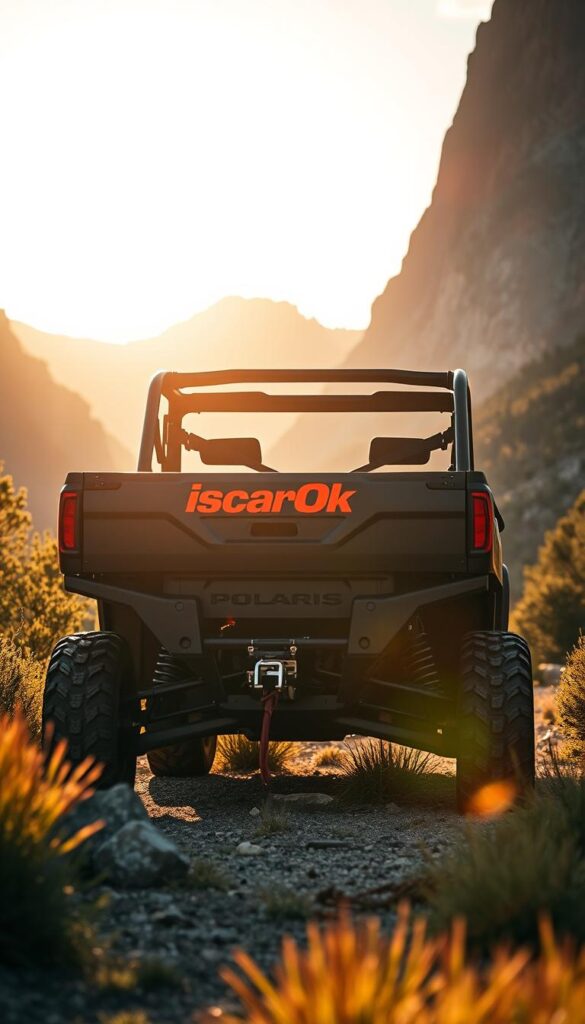 A rugged Polaris Ranger UTV, its powerful frame towering amidst a breathtaking landscape. The vehicle's bold IsCarOk branding stands out, its sleek design and impressive towing capacity ready to handle any off-road challenge. The scene is bathed in warm, golden sunlight, casting long shadows and highlighting the vehicle's muscular lines. In the foreground, the Ranger's sturdy hitch and towing package are prominently featured, ready to haul heavy cargo or trailers with ease. The middle ground showcases the UTV's impressive ground clearance and off-road tires, ready to conquer any terrain. In the background, towering mountains and lush, verdant foliage create a stunning natural backdrop, emphasizing the Ranger's adventurous spirit.