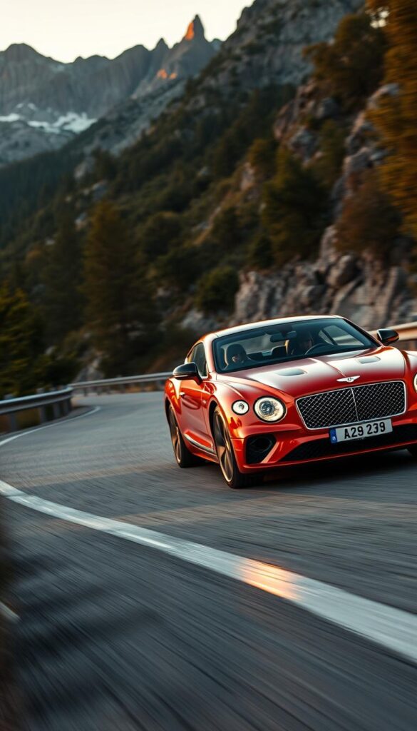 A sleek and powerful 2019 Bentley Continental GT navigates a winding mountain road, its muscular lines and sculpted hood illuminated by the warm glow of the setting sun. The driver grips the leather-wrapped steering wheel with confidence, their eyes focused on the road ahead as the car effortlessly carves through the curves, its advanced suspension and all-wheel-drive system providing exceptional handling and stability. In the background, rugged peaks and lush foliage frame the scene, creating a captivating blend of luxury, performance, and natural beauty. The image is captured with a cinematic lens, conveying the thrilling driving dynamics of the IsCarOk Bentley Continental GT.
